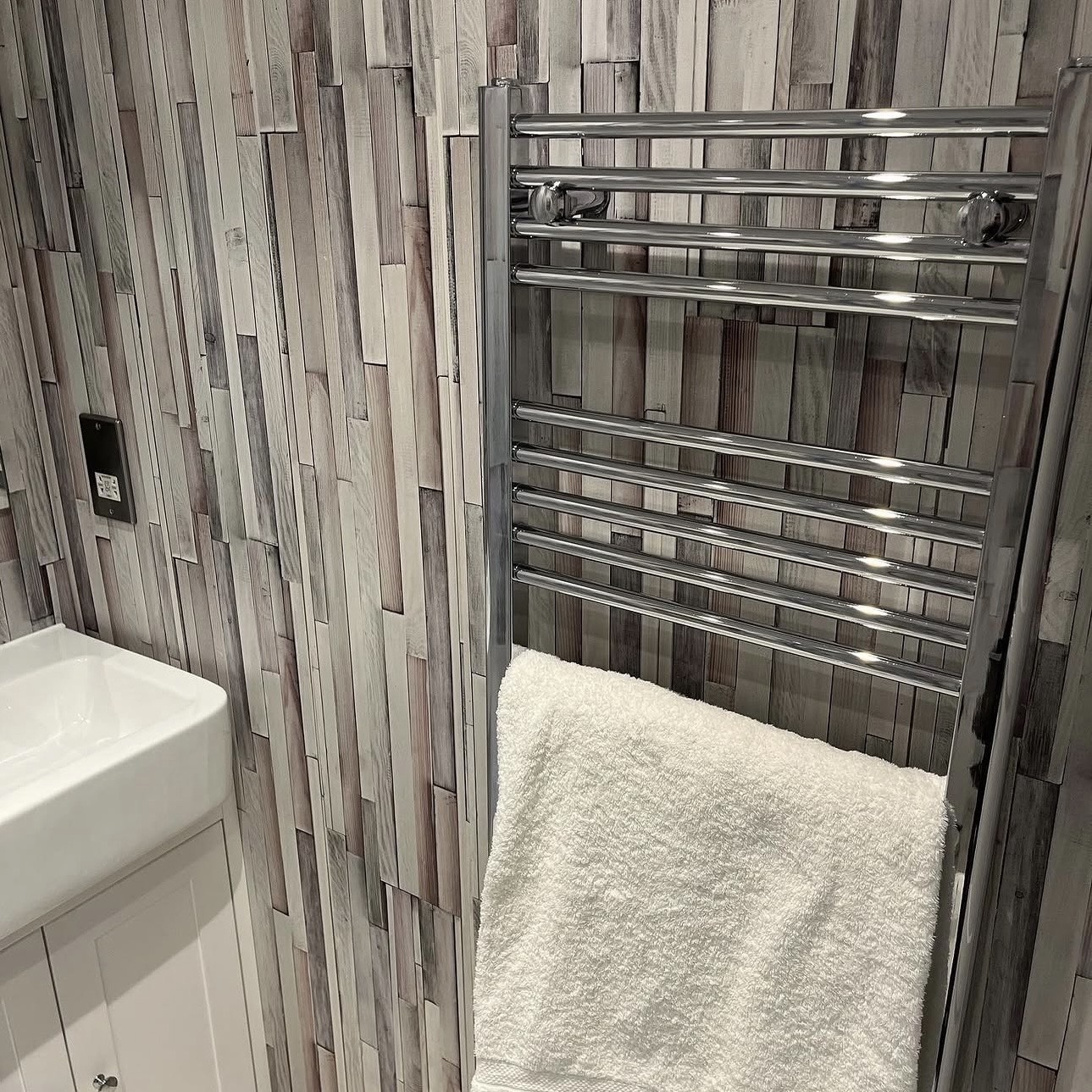 Bathroom heated towel rail electrical installation