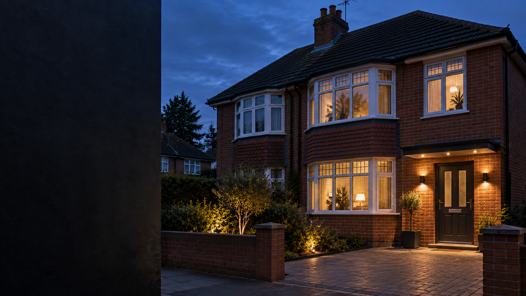A Birmingham home exterior with exterior lighting